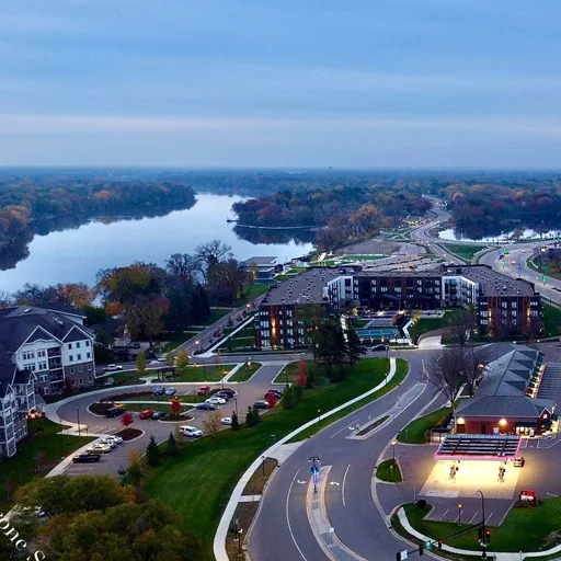 Champlin, MN – aerial of the Mississippi riverfront and band shell at dusk