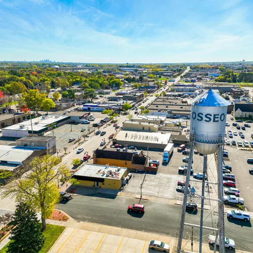 Osseo, MN – water tower over the small-town main street from above