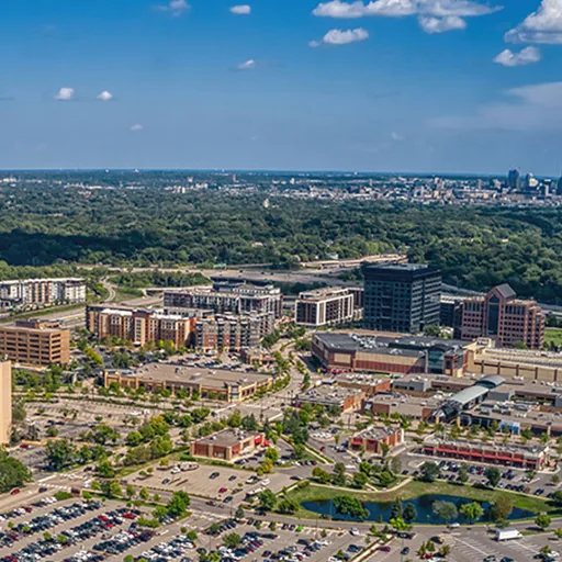 St. Louis Park, MN – West End district with the Minneapolis skyline beyond